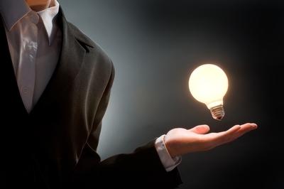Man with one bulb in hand.jpg